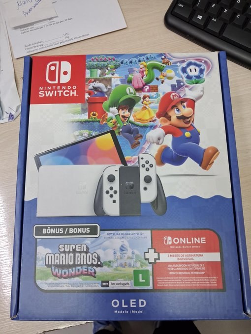 BUNDLE NINTENDO SWITCH OLED + SUPER MARIO BROS. WONDER