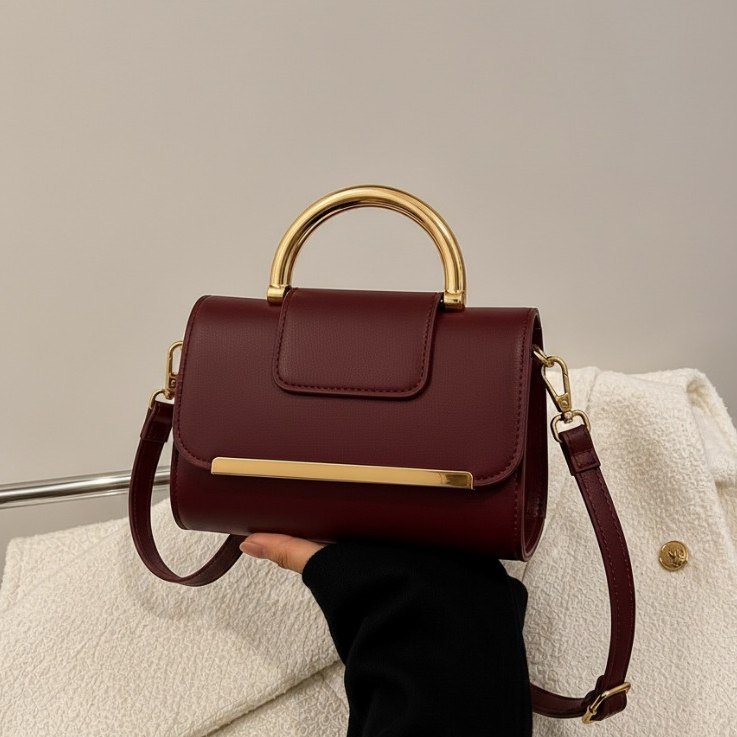 Bolsa feminina casual elegante com design moderno, com detalhes em dourado
